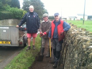 Volunteer team removing soil